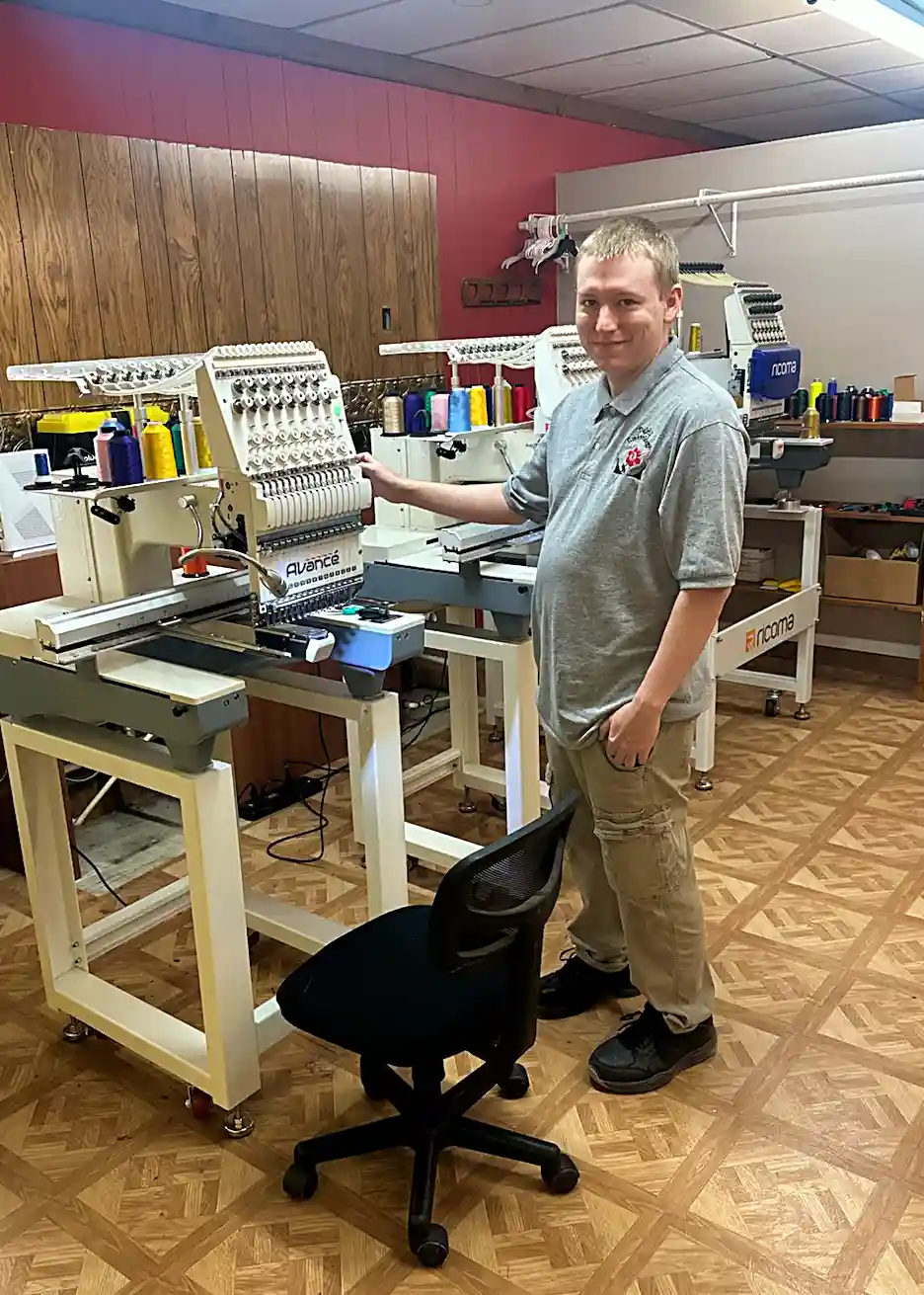David at Dejah Embroidery with professional embroidery machines