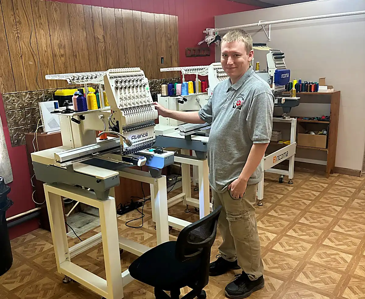 Chris Berry at Dejah Embroidery with professional embroidery machines